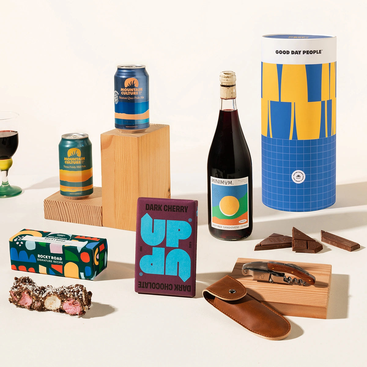Craft beer hamper with 2 cans of Mountain Culture beer, your wine of choice, chocolate, rocky road and a corkscrew. Packaged in a designed canister. Australia gift hamper.