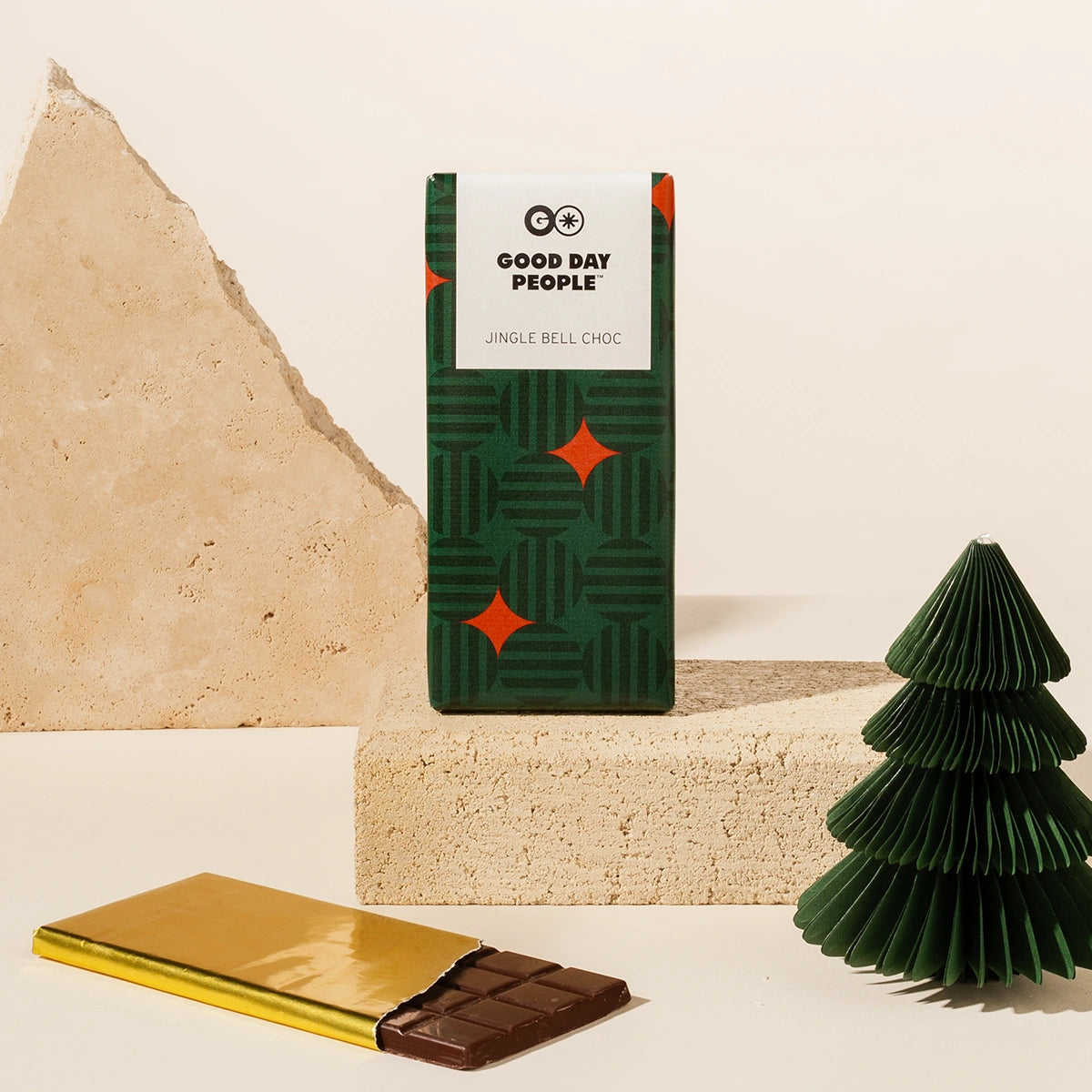 Gingerbread Chocolate bar with a 'Good Day People' packaging on a textured beige background