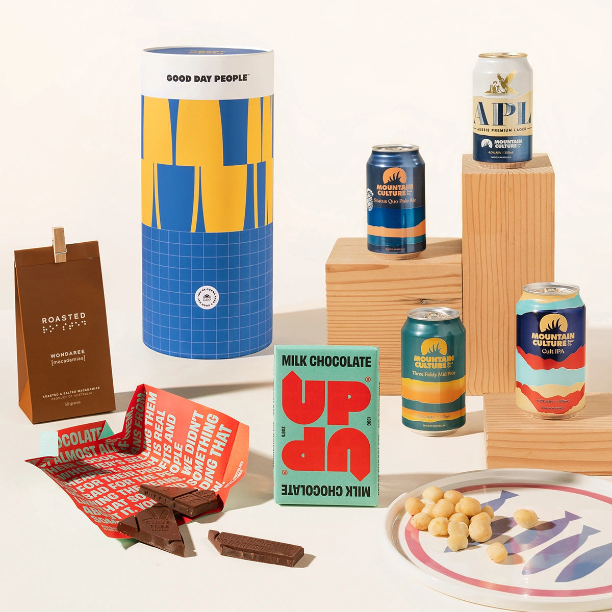 Craft beer hamper with 4 cans of Mountain culture beer, macadamias, and chocolate. Delivery Australia-wide.