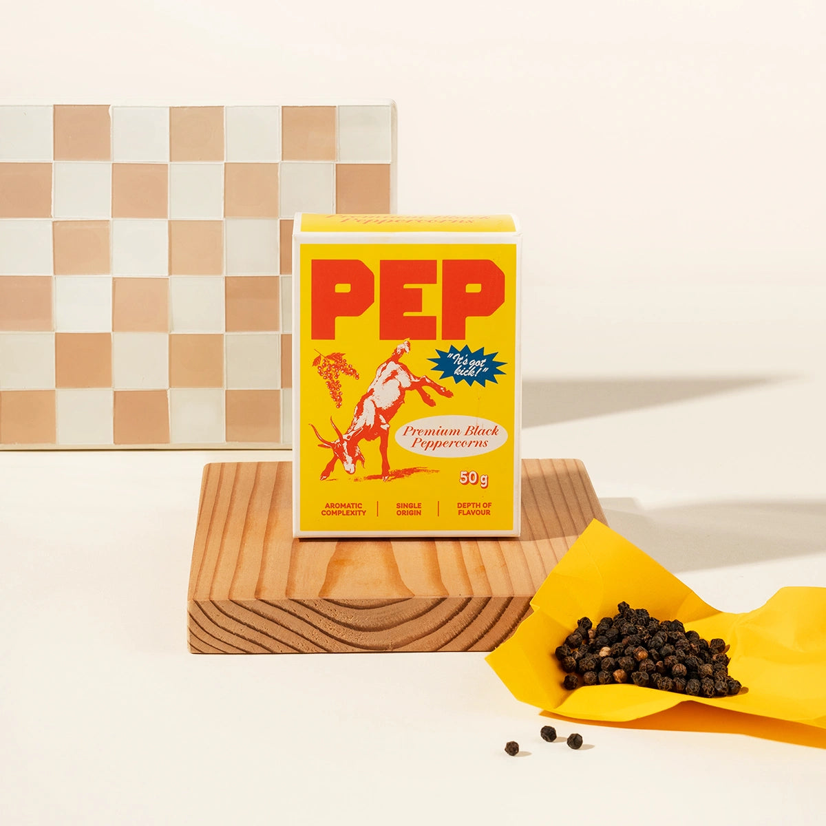 Yellow box of 'PEP' gourmet black pepper