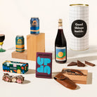 Craft beer hamper with 2 cans of Mountain Culture beer, your wine of choice, chocolate, rocky road and a corkscrew. Packaged in a designed canister. Australia gift hamper. 