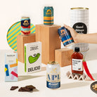 Craft beer gift hamper with 4 cans of Mountain Culture beer, burleigh chilli sauce, Garlic & truffle mixed nuts and organic chocolate. Packaged in a cool canister. 