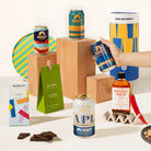 Craft beer gift hamper with 4 cans of Mountain Culture beer, burleigh chilli sauce, macadamias and organic chocolate. Packaged in a cool canister. 