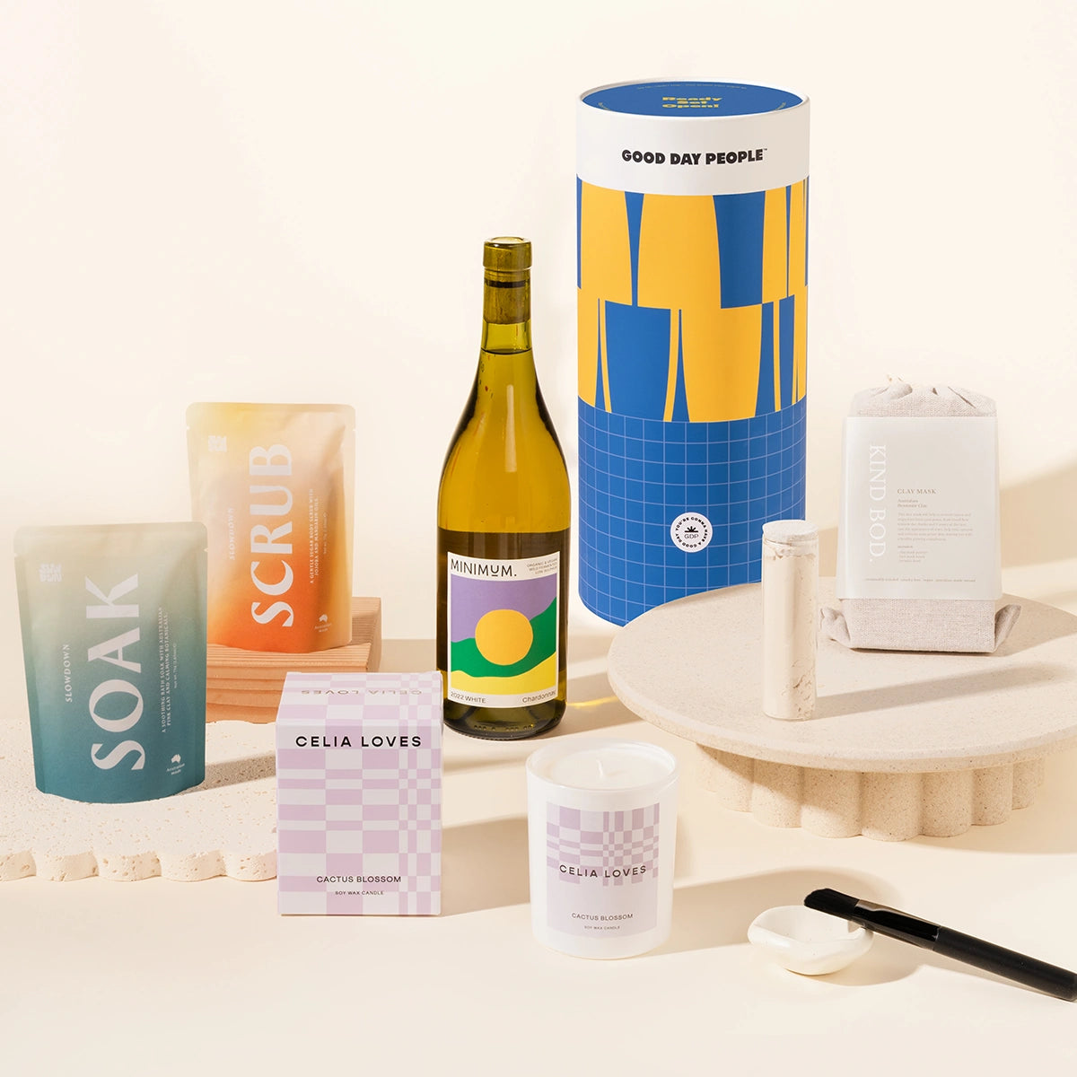 Hilarious Hannah pamper hamper with your choice of wine, a clay mask with ceramic holder and brush set, a scented candle, body soak and body scrub. Packaged in a designed canister.