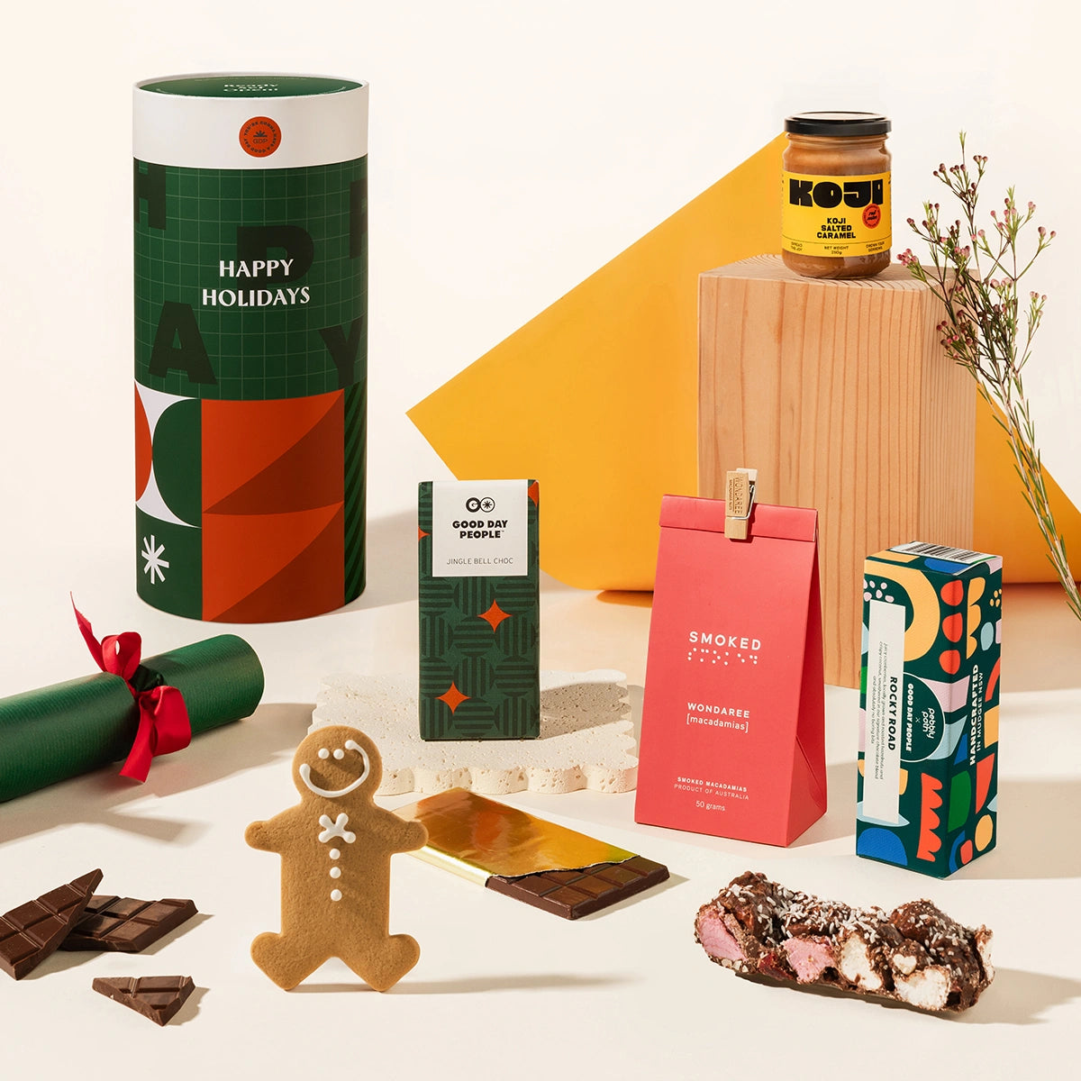 Jingle Jamie Christmas gift hamper with miso caramel, smoked macadamia nuts, gingerbread christmas chocolate, a gingerbread man, and rocky road. 