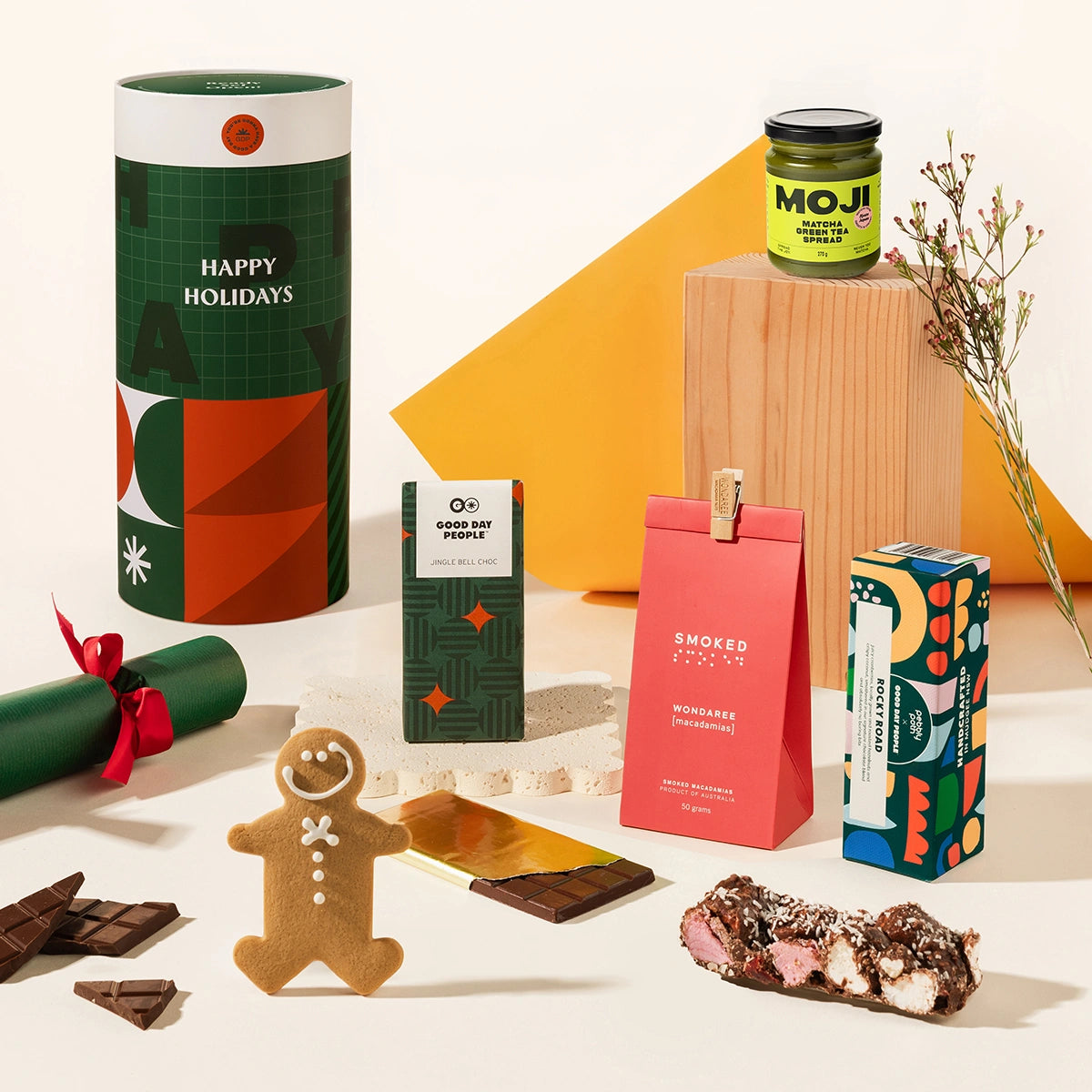 Jingle Jamie Christmas gift hamper with matcha spread, smoked macadamia nuts, gingerbread christmas chocolate, a gingerbread man, and rocky road. 