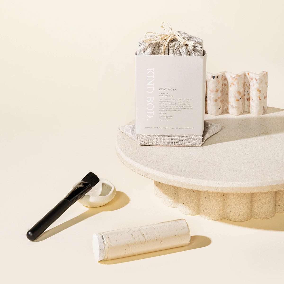 Kind Bod Clay mask set wth a brush, ceramic holder and a glass tube filled with clay mask powder
