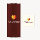 Brown cylindrical container with 'Welcome.' logo and heart design on a white background