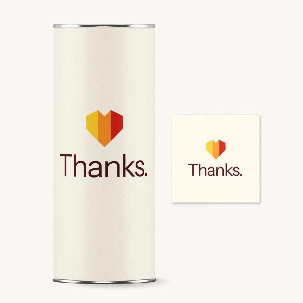 White cylindrical container and square card with 'Thanks.' and heart design on a white background