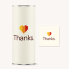 White cylindrical container and square card with 'Thanks.' and heart design on a white background