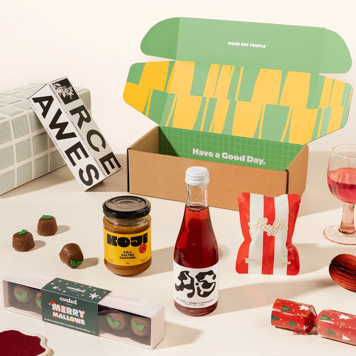 Christmas gift box with a non-alcoholic G&T, fancy fairy floss, miso caramel and chocolate coated christmas marshmallows