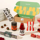 Christmas gift box with a non-alcoholic G&T, fancy fairy floss, miso caramel and chocolate coated christmas marshmallows