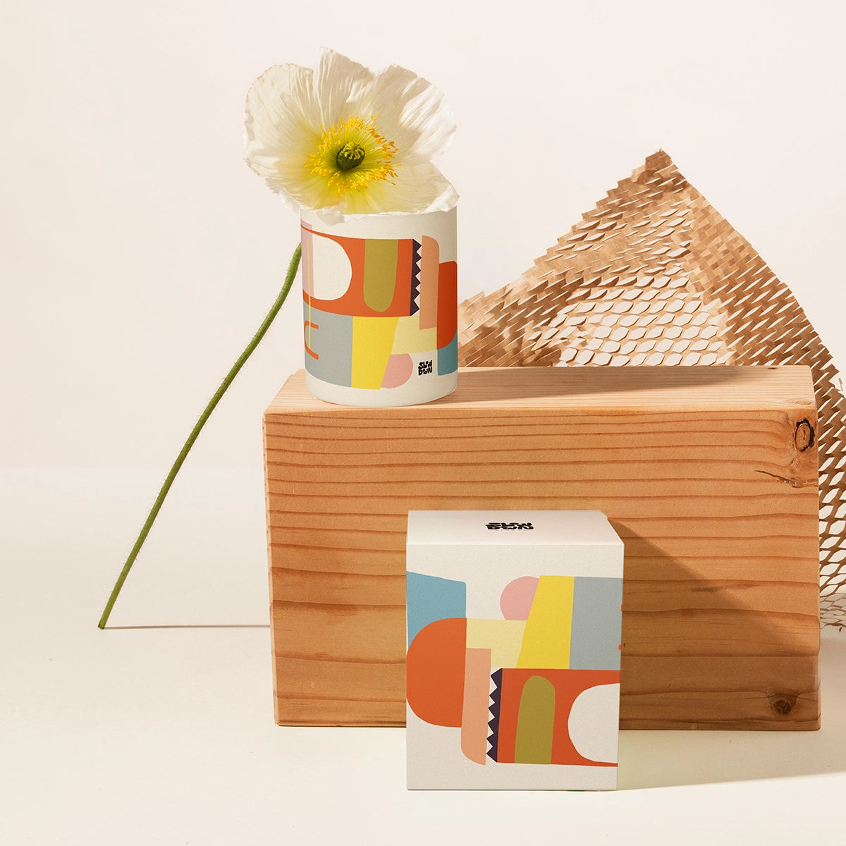 Slowdown Studio Elwood Scented Candle with notes of pine needle, eucalyptus, lemon myrtle, patchouli and sandalwood. Comes in an artful jar that can be used as decor. 