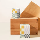 Slowdown Studio Tommy Scented Candle with notes of tobacco, amber, musk, honey iris and rose. Comes in an artful jar that can be used as decor. 