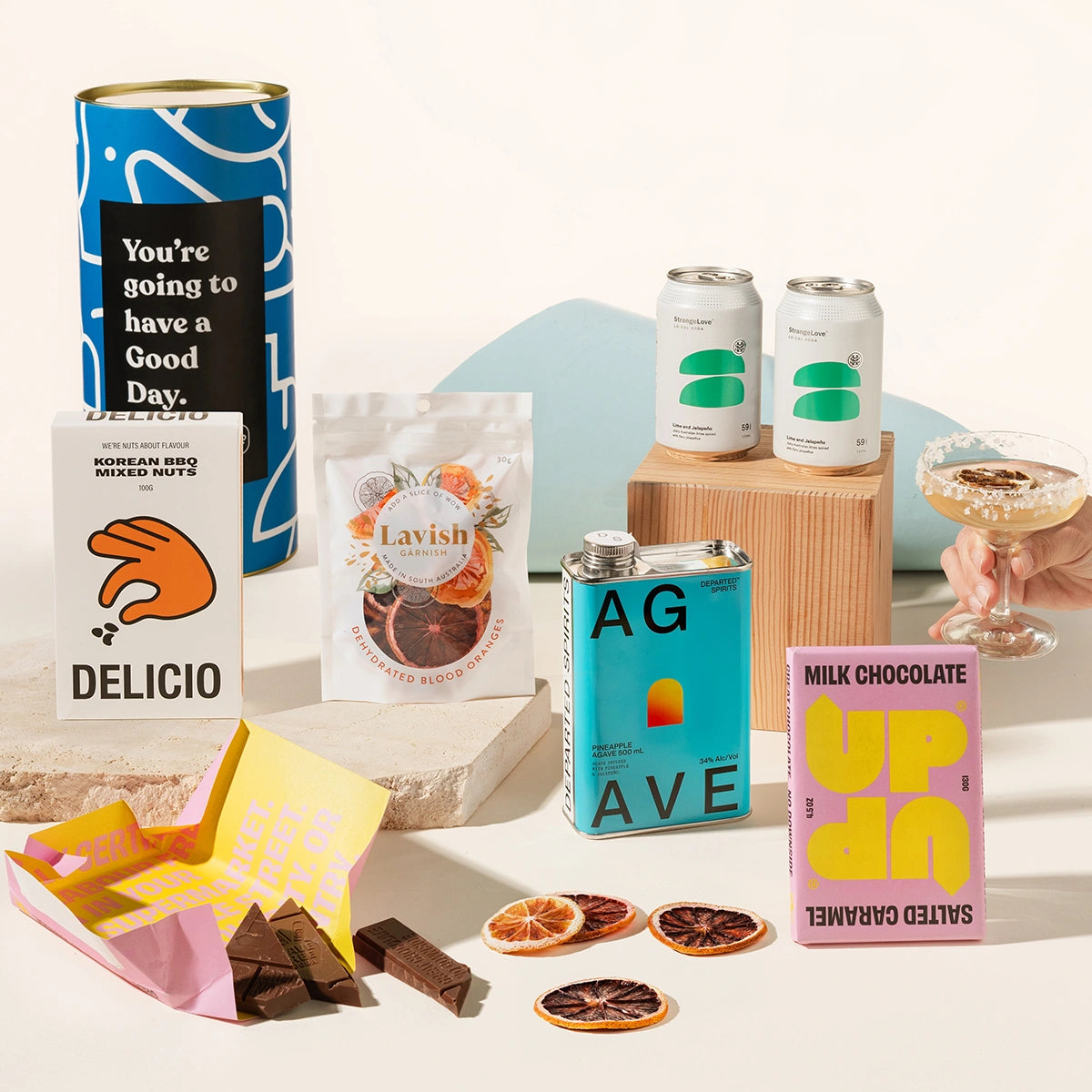 Margarita-themed gift hamper including Strangelove lime & jalapeno cans, Agave spirit, milk chocoloate and blood orange garnish.