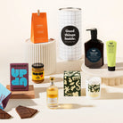 Trivia Olivia Luxury Gift Hamper with treats, a candle and a body wash and lotion set