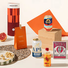 Craft beer hamper with 2 cans of Mountain Culture beer, Ester mandarin gimlet, tiger buck beef jerky, and macadamias. 